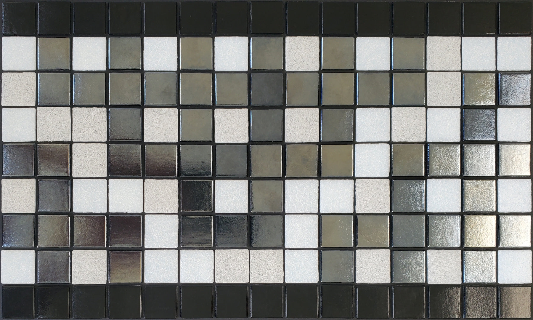 Alma  C - botanical glass mosaic waterline pool border tile - glossy black, white and metallic silver in a garden trellis pattern. 