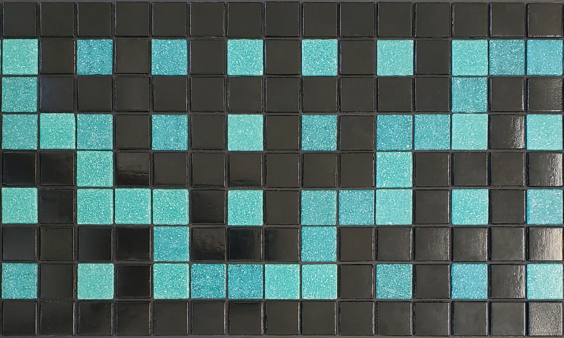 Alma  P - botanical glass mosaic waterline pool border tile - glossy black and teal in a garden trellis pattern. 