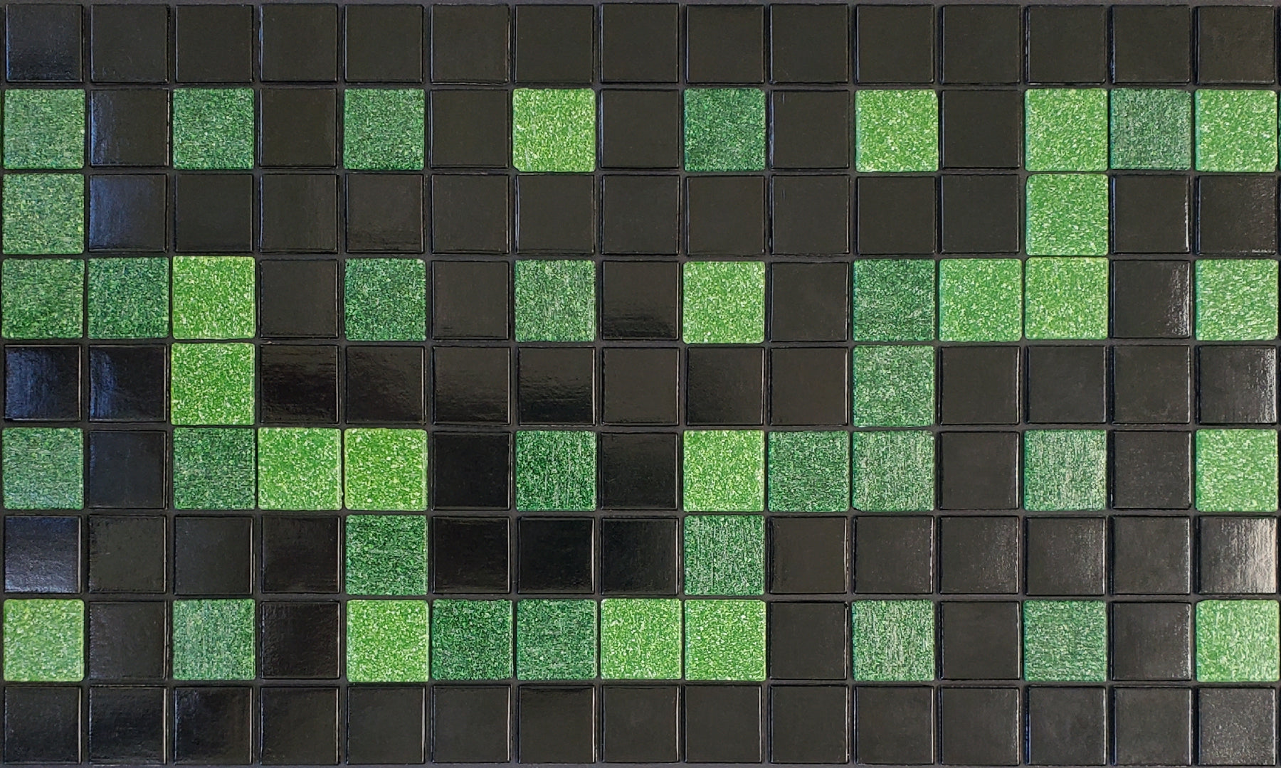 Alma  Q - botanical glass mosaic waterline pool border tile - glossy black and green in a garden trellis pattern. 