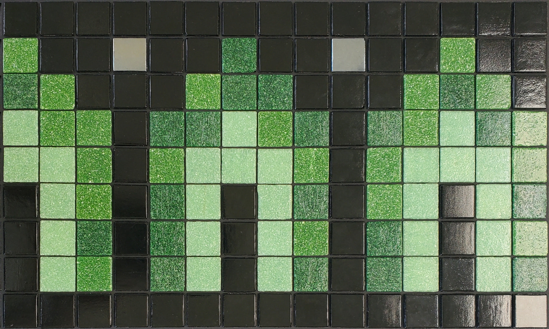 Marrakech AA - Moroccan-inspired glass mosaic waterline pool border tile - green archways surrounded by glossy black  with metallic silver dot accents.