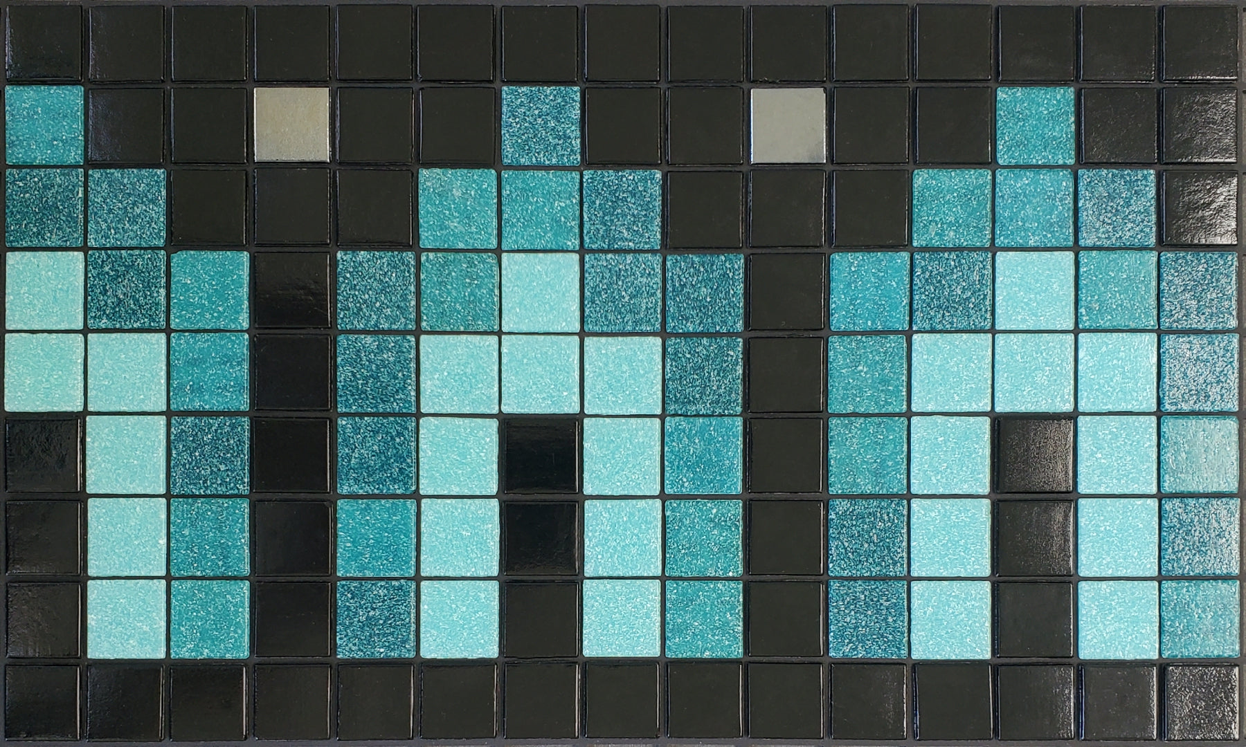 Marrakech AC - Moroccan-inspired glass mosaic waterline pool border tile - teal and light blue archways surrounded by glossy black with metallic silver dot accents.