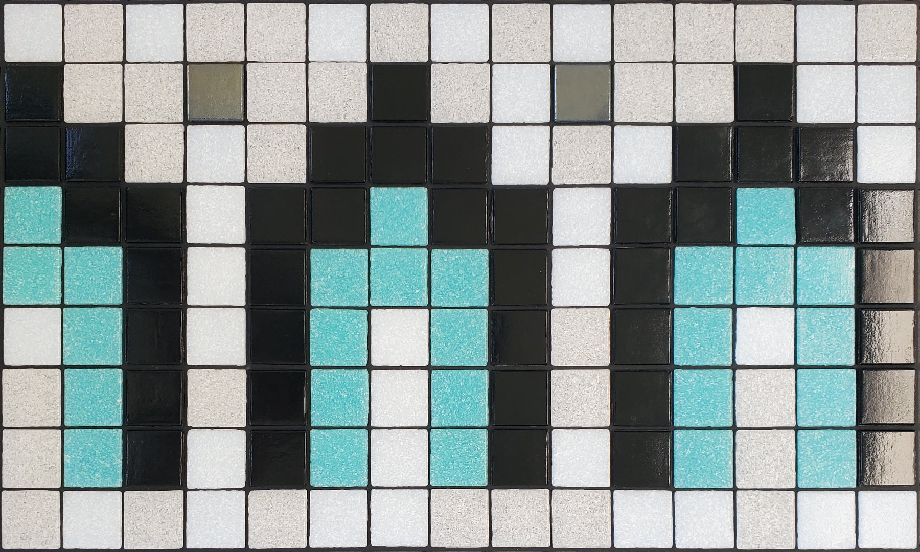 Marrakech AE - Moroccan-inspired glass mosaic waterline pool border tile - glossy black, aqua, white archways with metallic silver dot accents.