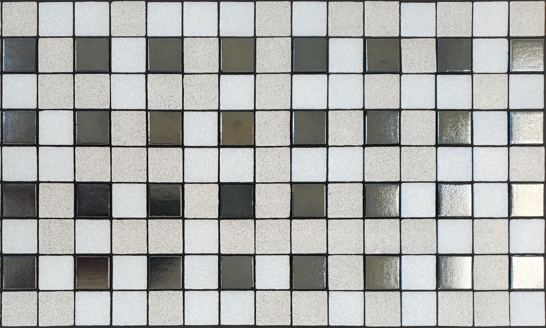 Parker A - modernism-inspired checkerboard glass mosaic waterline pool border tile - white and metallic silver tiles in a punctuated grid.