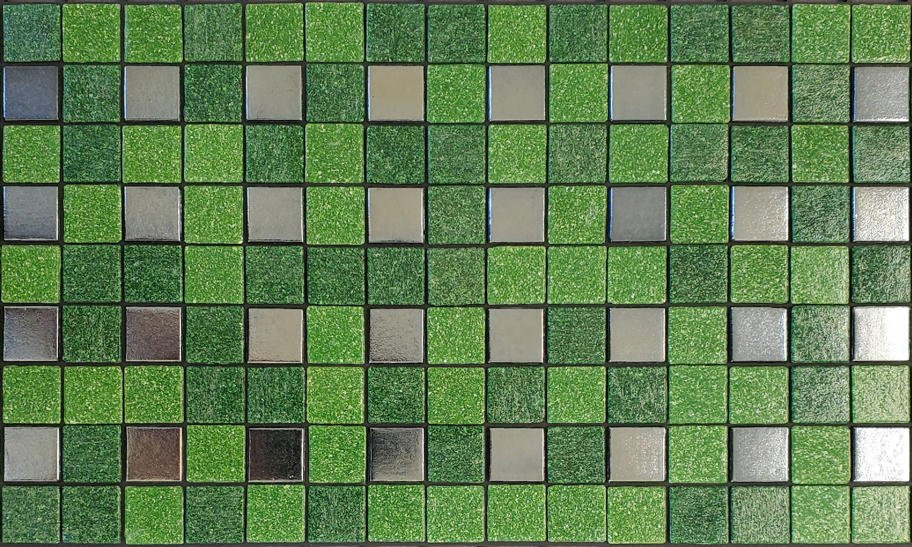Parker E - modernism-inspired checkerboard glass mosaic waterline pool border tile - green and metallic silver tiles in a punctuated grid.