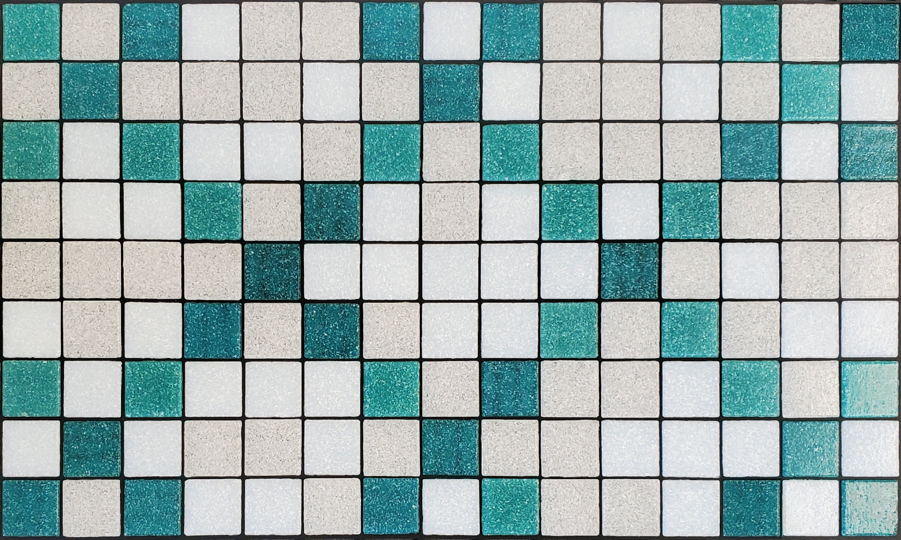 Souk AD - Moroccan-inspired glass mosaic waterline pool border tile - teal and white tiles in an "x" pattern.