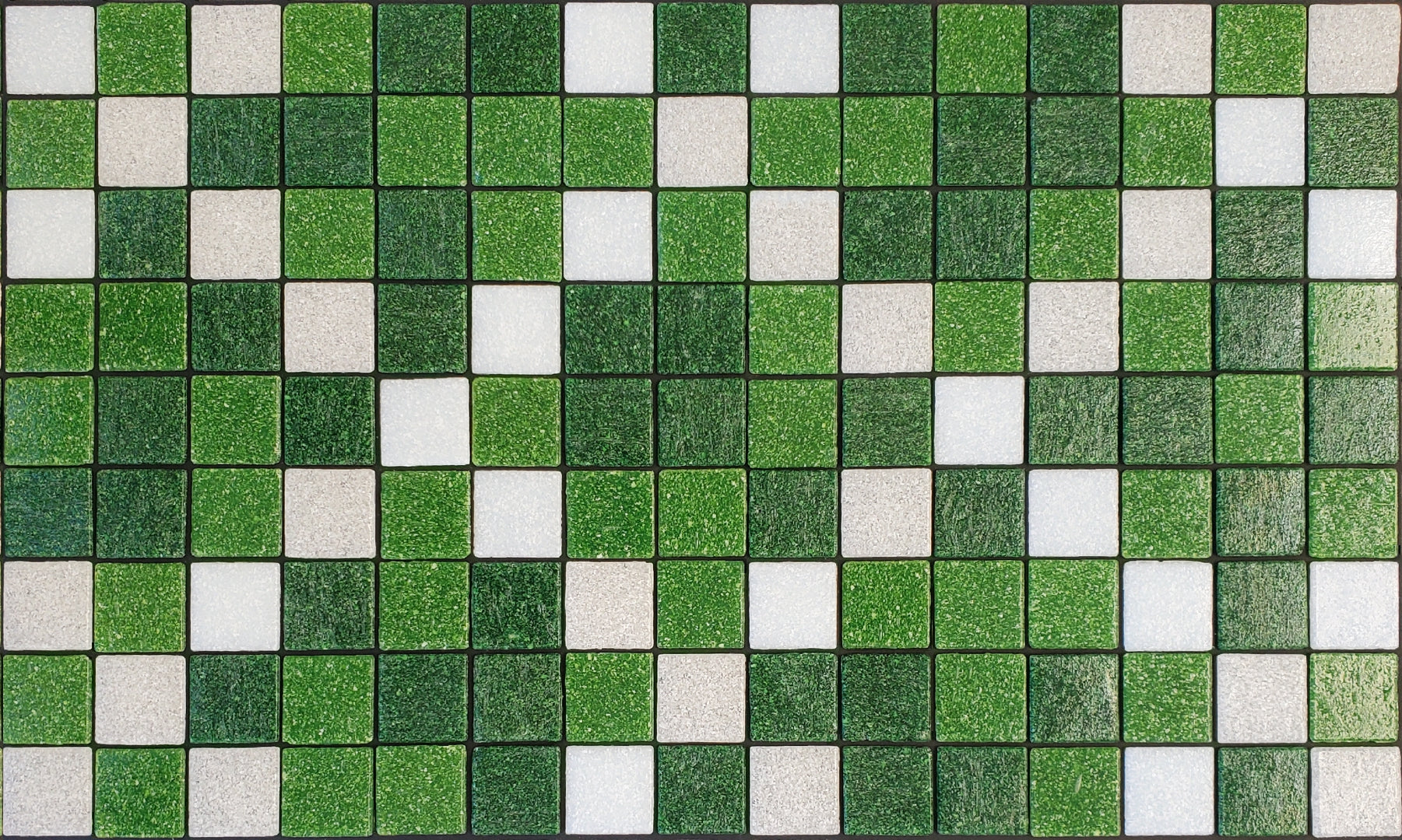 Souk N - Moroccan-inspired glass mosaic waterline pool border tile - green and white tiles in an "x" pattern.